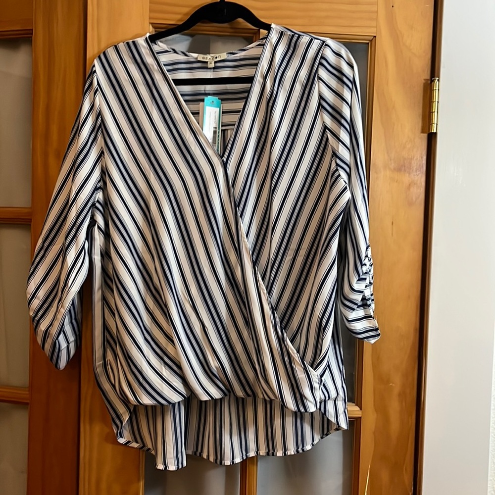 Lightweight summer faux wrap blouse.